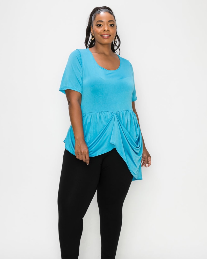 Front of a model wearing a size 1X Savannah Draped Peplum Top in Turquoise by L I V D. | dia_product_style_image_id:241660